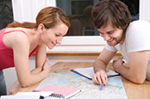 Two persons working together
